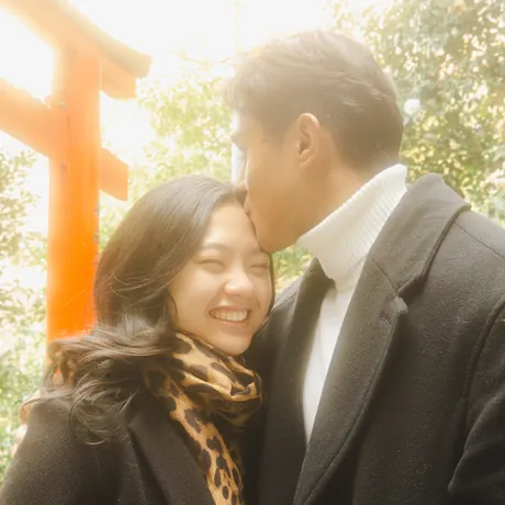 Priam and Eden at a red torii gate